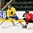 GRAND FORKS, NORTH DAKOTA - APRIL 18: Sweden's Adam Thilander #8 skates with the puck while Switzerland's Fabian Berni #9 defends during preliminary round action at the 2016 IIHF Ice Hockey U18 World Championship. (Photo by Minas Panagiotakis/HHOF-IIHF Images)

